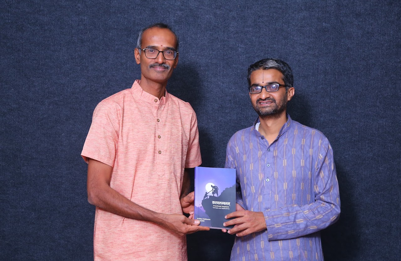 Dr Sridhar Subbanna and Dr V. Srinidhi with Karāvalambanam